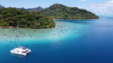 Cruise boats in Auea Bay, Huahine, Leeward Islands, French Polynesia