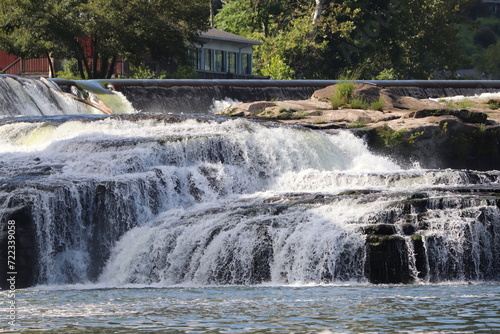 Fototapeta Naklejka Na Ścianę i Meble -  Waterfall and dam in a small river town in West Virginia. 