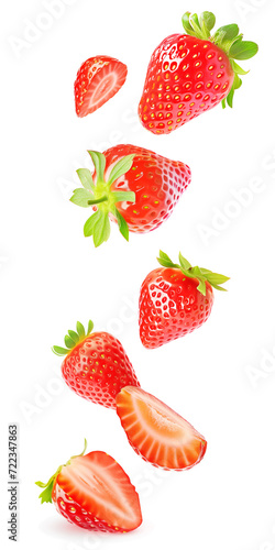 Falling whole and halved strawberries isolated on white background
