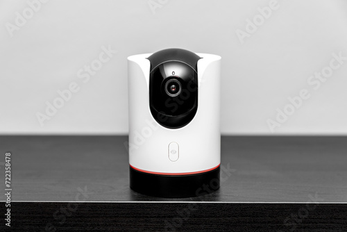 indoor CCTV wireless IP security camera with 360 degrees rotating head, Concept of home security system for surveillance and protection. safety control, crime protect