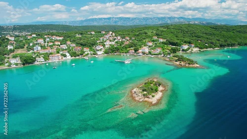 Amazing crystal clear sea water of the Gonar beach on Rab island, Croatia photo