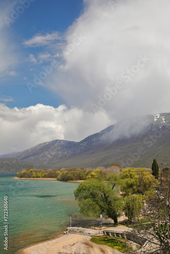 Lake Ohrid shore as seen from Saint Naum monastery in an eastwards view, Galicica mountain background. Ljubanista-North Macedonia-271