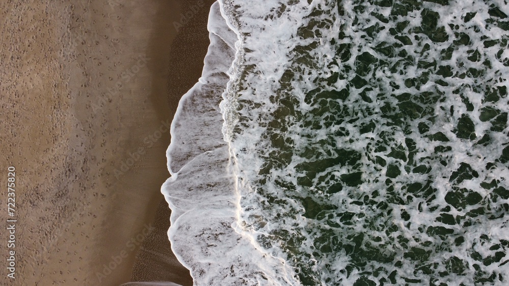 Waves on the beach taken from above