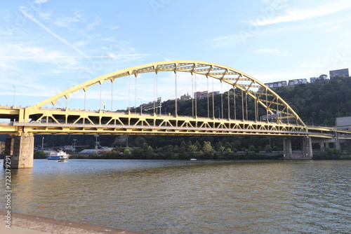 Andy Warhol Bridge and other famous yellow bridges in downtown Pittsburgh, Pennsylvania. Over Point State Park. Panoramic view of downtown.