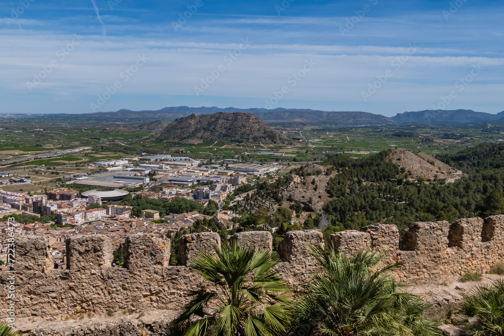Fototapeta premium Xativa Castle or Castillo de Xativa - ancient fortification on the ancient roadway Via Augusta in Spain. Medieval ruins of the walls of Xativa castle. Xativa, Spain, Europe.