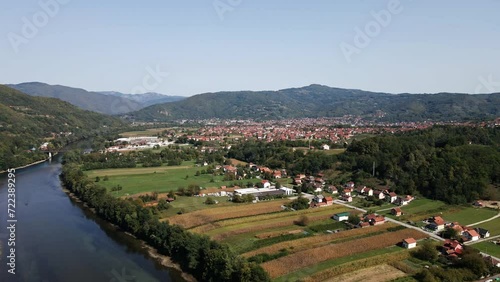 Town Bajina Basta on river Drina surrounded with Tara mountains photo