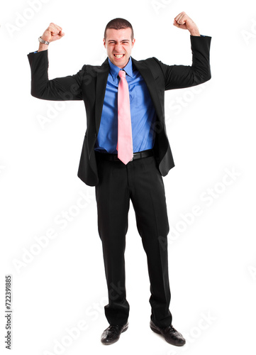 Young businessman in formal attire flexes his muscles, expressin photo