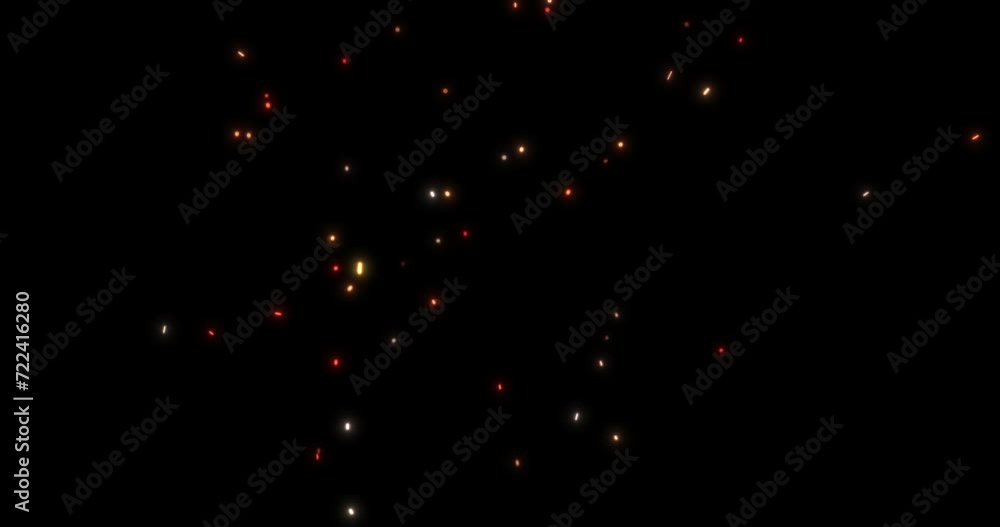 Slowly rising glowing sparks from the fire. Yellow and orange particles on a black background. Seamless looping animation. Slowly rising glowing sparks from the fire. Yellow and orange particles on a black background. Seamless looping animation.