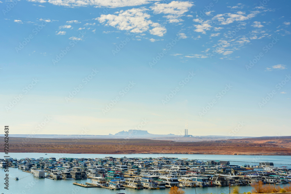Boat Marina at Lake Powell with Coal Power Plant in the Background - 4K Ultra HD Image of Contrasting Landscapes