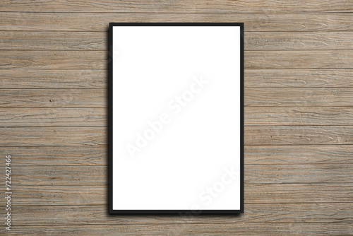 Picture frame on a white wooden wall white frame. Blank Mockup .
