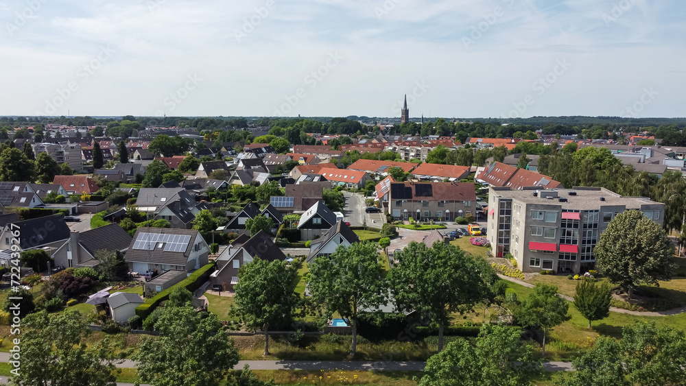 Aerial drone view of homes, houses and apartments in Steenwijk, Overijssel, The Netherlands. Residential area neighborhood architecture captured from above.
