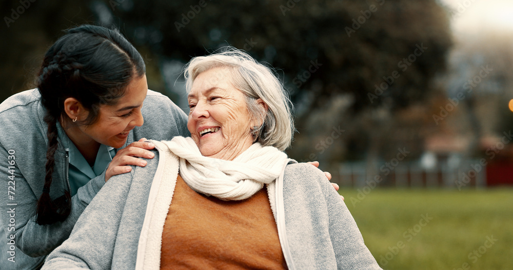 Caregiver helping woman with disability in park for support, trust and care in retirement. Nurse talking to happy senior patient in wheelchair for rehabilitation, therapy and conversation in garden - obrazy, fototapety, plakaty 