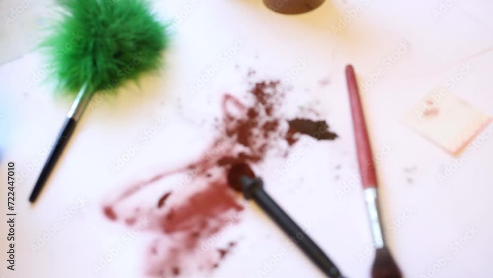 Many stationery with a brush for dactylography are standing on the table Many stationery with a brush for dactylography are standing on the table