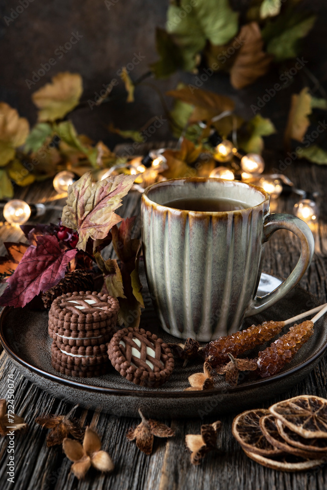 Fototapeta premium Composition with tea cup and cookies on wooden table