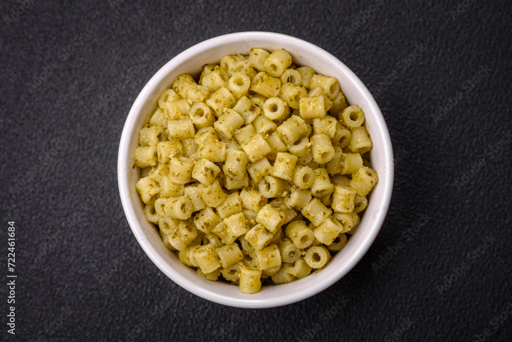 Delicious ditali pasta from durum wheat with salt and spices Delicious ditali pasta from durum wheat with salt and spices