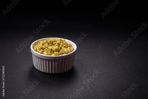 Delicious ditali pasta from durum wheat with salt and spices photo