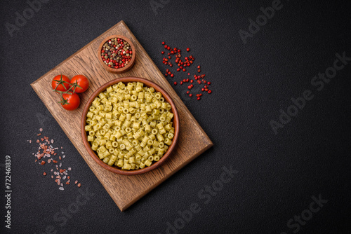 Delicious ditali pasta from durum wheat with salt and spices photo