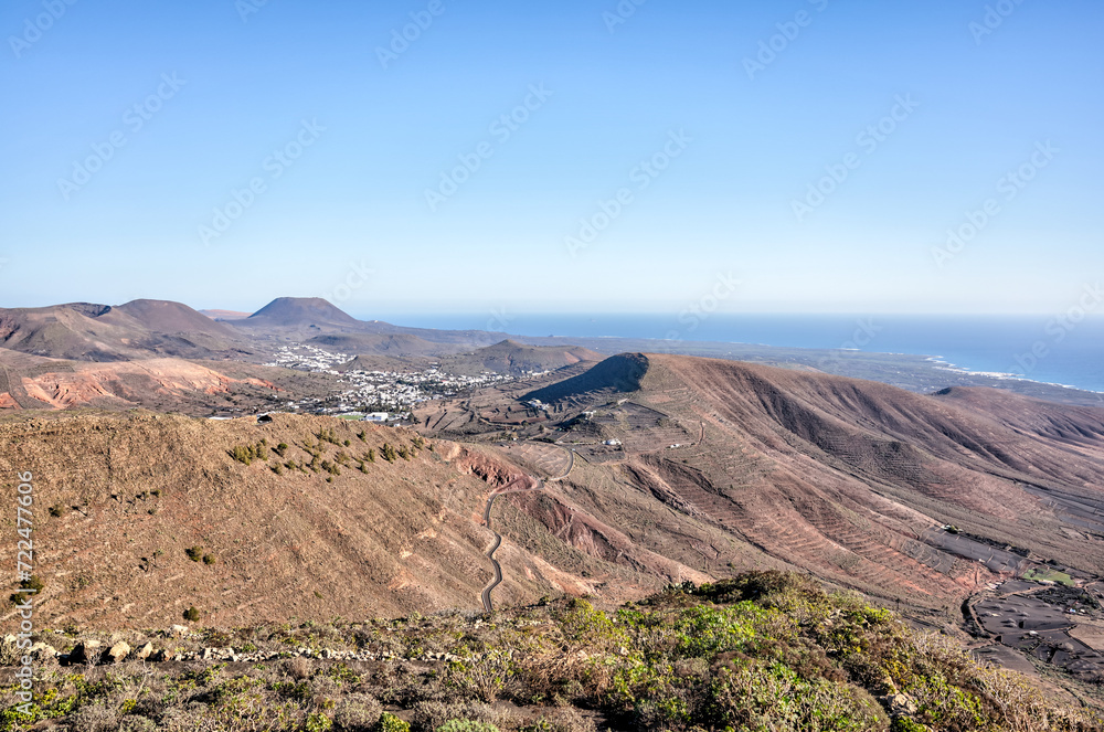 Lanzerote, Spain - December 24, 2023: Highways and sights amongst the volcanic landscapes on the island of Lanzerote in Spain's Canary Islands
