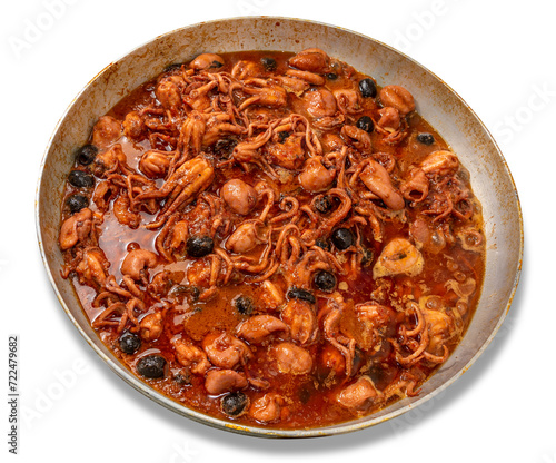 Baby Octopus in tomato sauce in aluminium pan isolated  Stewed octopus with tomatoes and olive - Italian recipe called moscardini alla Luciana recipe of Neapolitan cuisine. photo