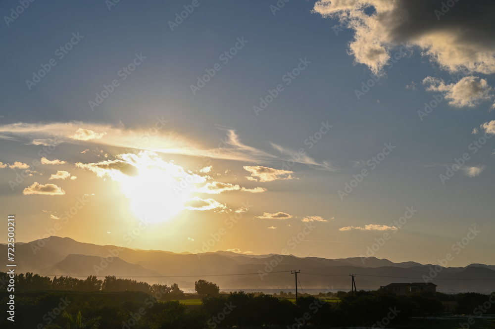 Fototapeta premium the sun sets behind the mountains in Cyprus 4