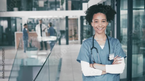 Hospital, face and confident nurse with smile, arms crossed and professional career in healthcare service. Portrait of happy doctor, caregiver or medical worker at job in lobby of health care clinic. photo