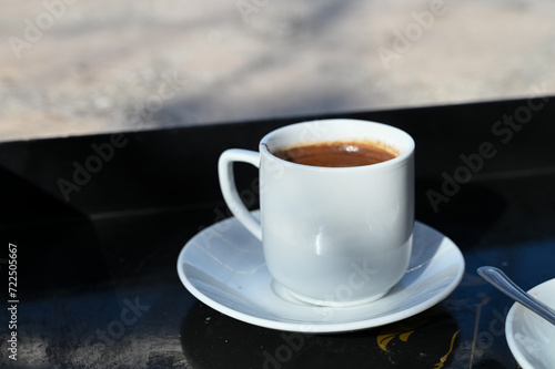 Turkish coffee in a white cup 8