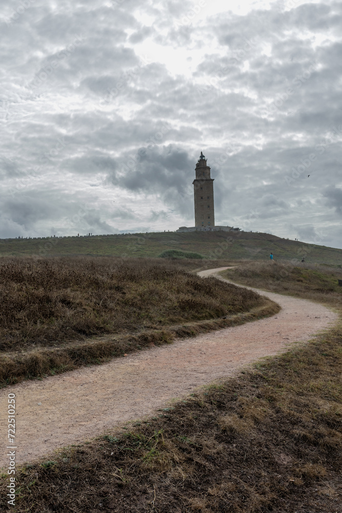The Coastal Beacon: Path to the Towering Lighthouse