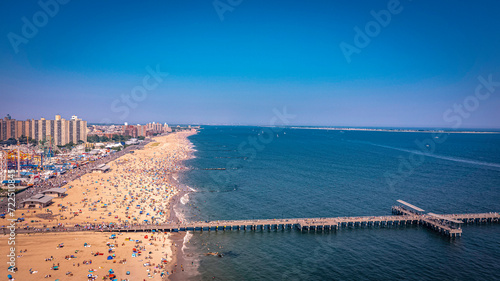 Aerial Shot of Coney Island Beach and Pier in the Summer