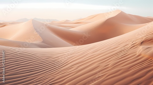 Close-up of a sand dune with wind-created patterns in a desert landscape