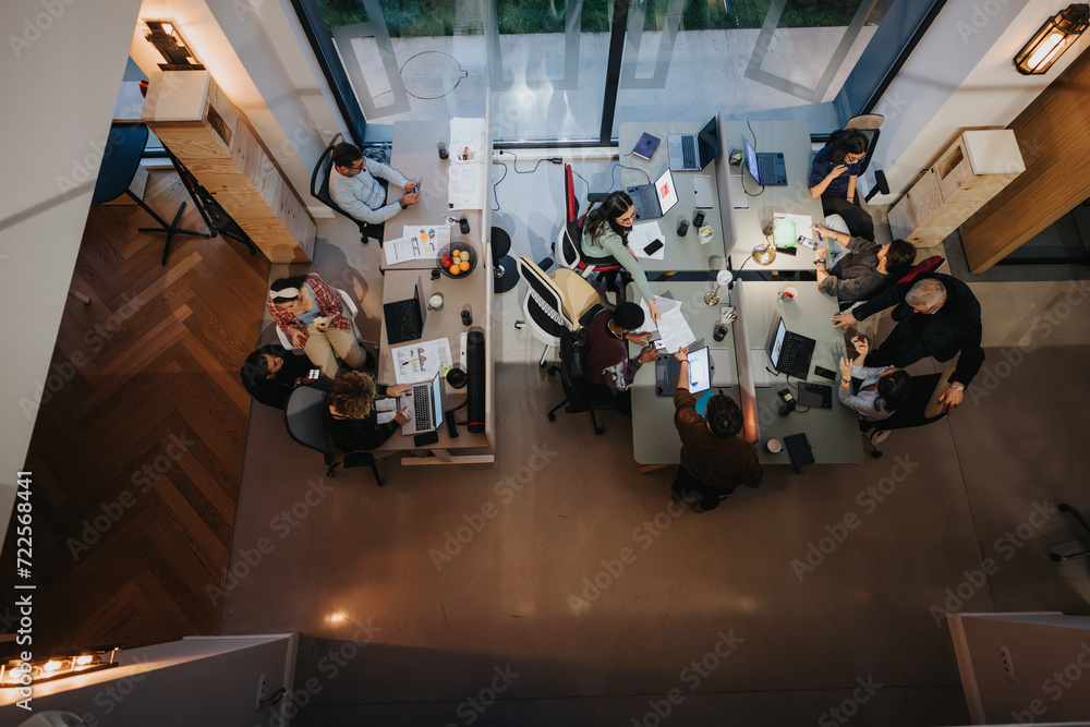 Multicultural team of business professionals engaged in a business meeting at modern office. Multicultural team of business professionals engaged in a business meeting at modern office.