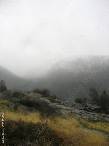 Beautiful foggy landscape photograph. American national park. Hetch Hetchy valley. Yosemite National Park. 