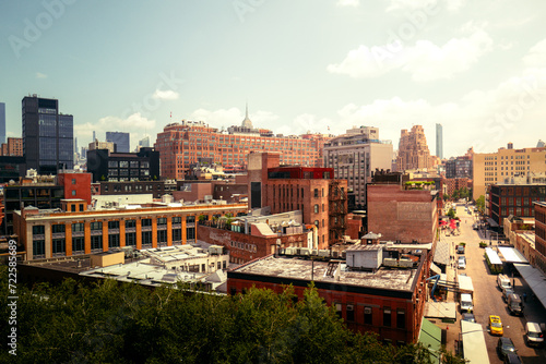 Manhattan, New York City, Meat Packing District overlooking Greenwich and west village in bright, warm and cinematic daylight. Skyscrapers and traditional American red brick buildings