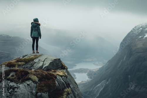 Person Standing on Mount Everest Summit