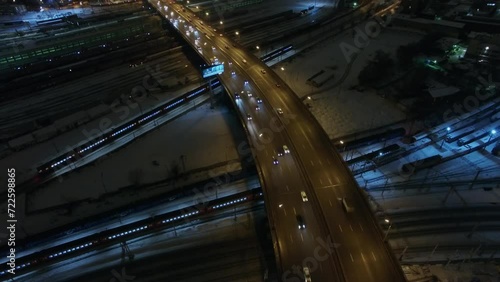 Highway traffic on Rizhskaya flyover above railroad at winter  photo