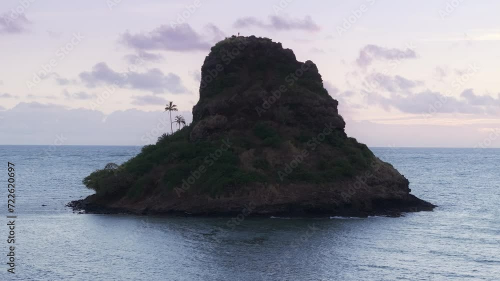 Oahu Pyramid Video Stock Chinamans Hat pyramid island on background of pastel blue ...
