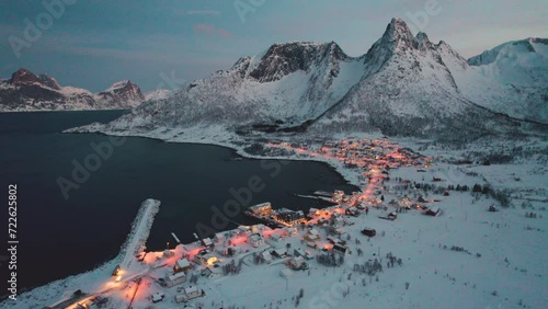 Drohnenaufname eines Norwegischen Fjord im Winter bei Abendlicht (Lofoten) photo