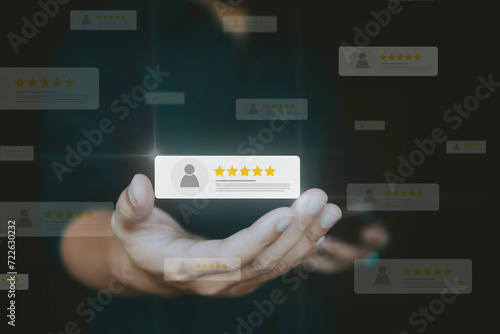 Customer review good rating concept, hand pressing user and five star icon on visual screen for positive customer feedback, testimonial and testimony, user comment and feedback for review. 
