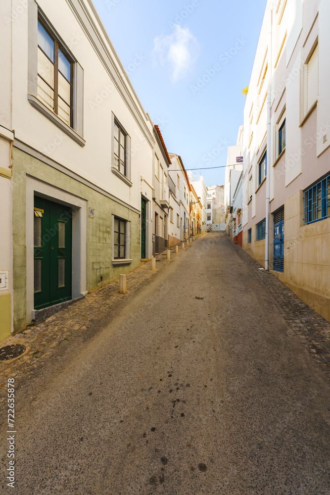 Narrow street in Lagos Old town, Algarve, Portugal