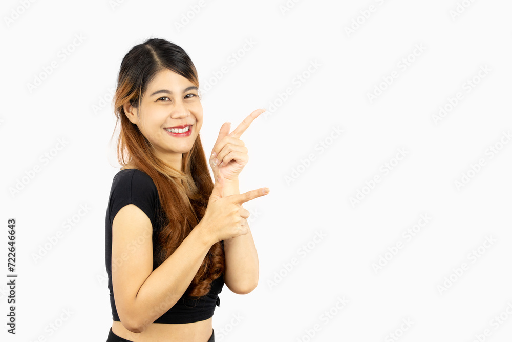 Pretty asian woman long hair style posing smiling and fingers pointing isolated on white background. Pretty asian woman long hair style posing smiling and fingers pointing isolated on white background.