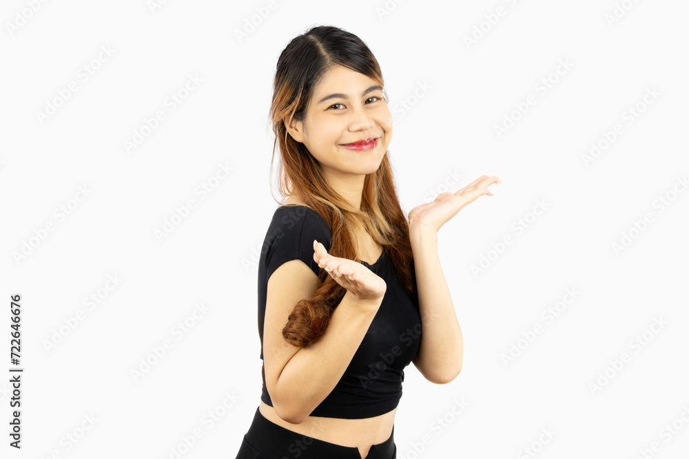 Portrait of young asian woman long hair style smiling and hands pointing presenting isolated on white background. Emotional face. Portrait of young asian woman long hair style smiling and hands pointing presenting isolated on white background. Emotional face.