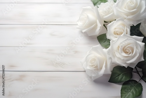 beautiful white roses on a wooden patterned background © candra