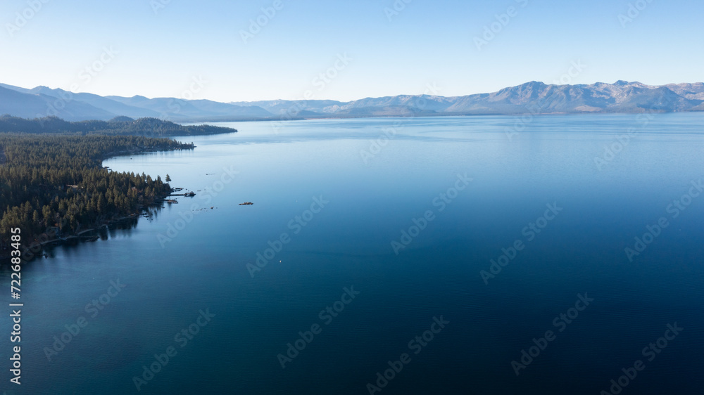 Panoramic view of Lake Tahoe, California coastline with mountains landscape 