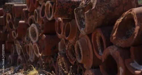 close up of a stack of ancient drainage pipes in Ephesus. photo