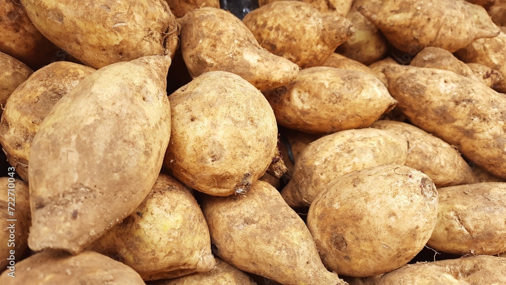 Sweet potatoes background. Sold in Indonesian local market. Sweet potatoes background. Sold in Indonesian local market.
