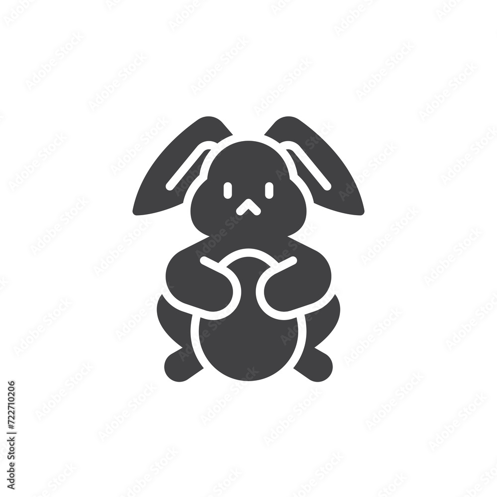Bunny holding an Easter egg vector icon