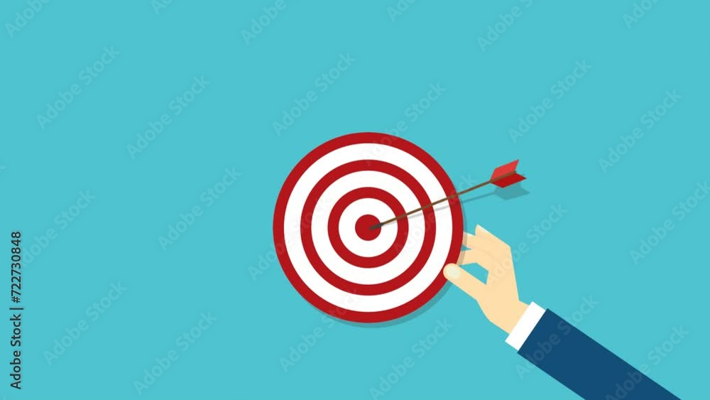 Hand holding a target, showing a goal. Red arrow hits the center. Business challenge failure and success concept. Hand holding a target, showing a goal. Red arrow hits the center. Business challenge failure and success concept.