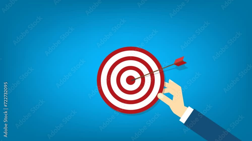 Hand holding a target, showing a goal. Red arrow hits the center. Business challenge failure and success concept. Hand holding a target, showing a goal. Red arrow hits the center. Business challenge failure and success concept.