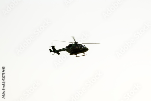 Fototapeta Naklejka Na Ścianę i Meble -  helicopter is flying on isolated white background