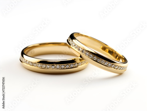 Golden wedding rings symbolizing love and marriage, isolated on a white background,Generative Ai