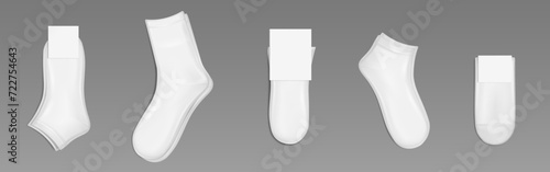White socks mockups set isolated on gray background. Vector realistic illustration of blank pieces of clothing for feet with empty carton labels, cotton cloth garment, corporate branding template